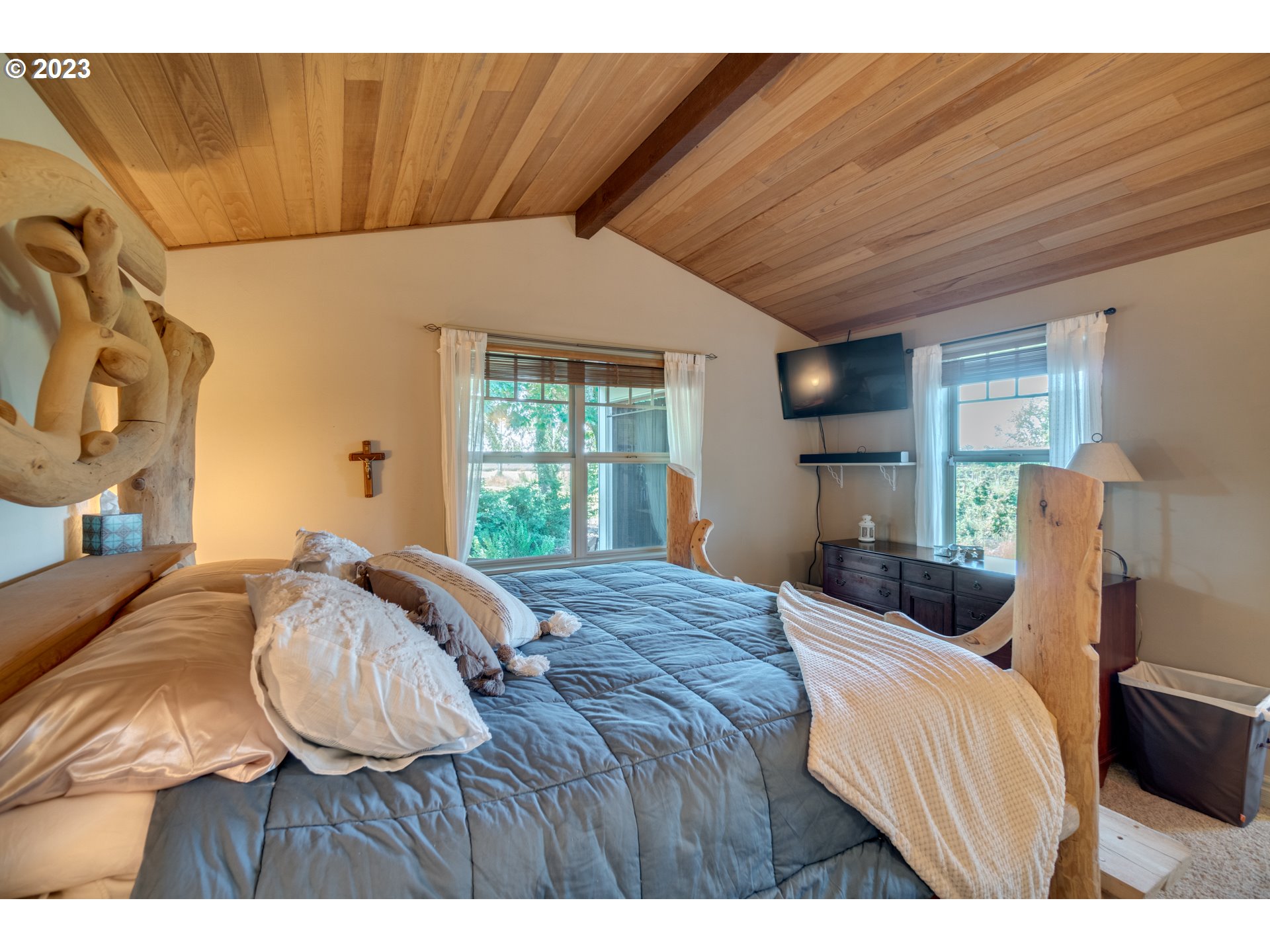 1675 South Boones Ferry Road Woodburn, OR 97071 - Photo 16 of 45 a bedroom with a bed a window and dresser