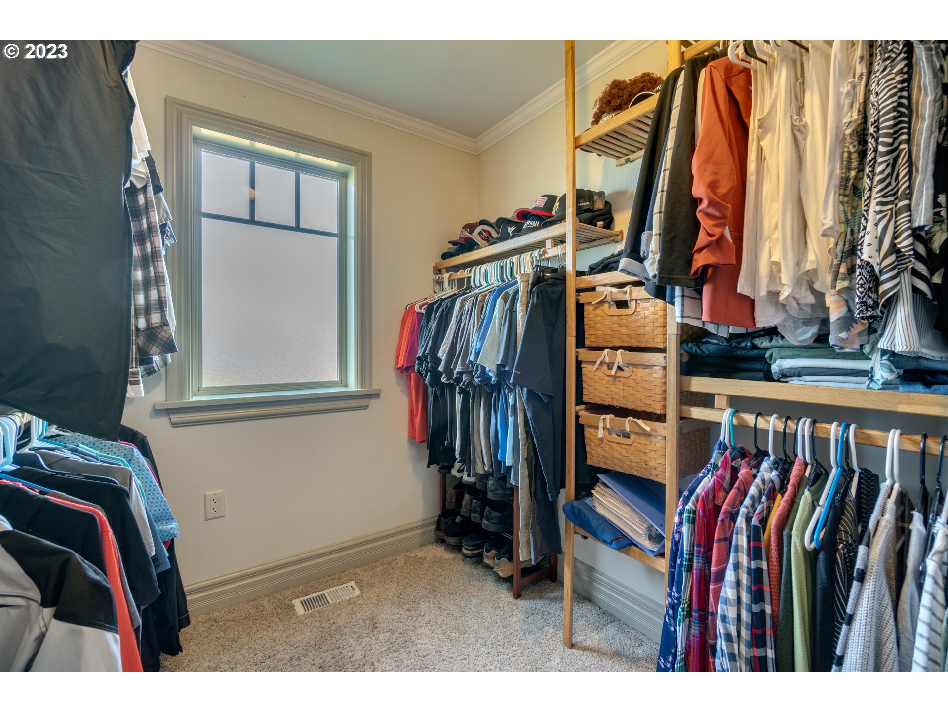 1675 South Boones Ferry Road Woodburn, OR 97071 - Photo 17 of 45 a view of walk in closet with clothes and shoes
