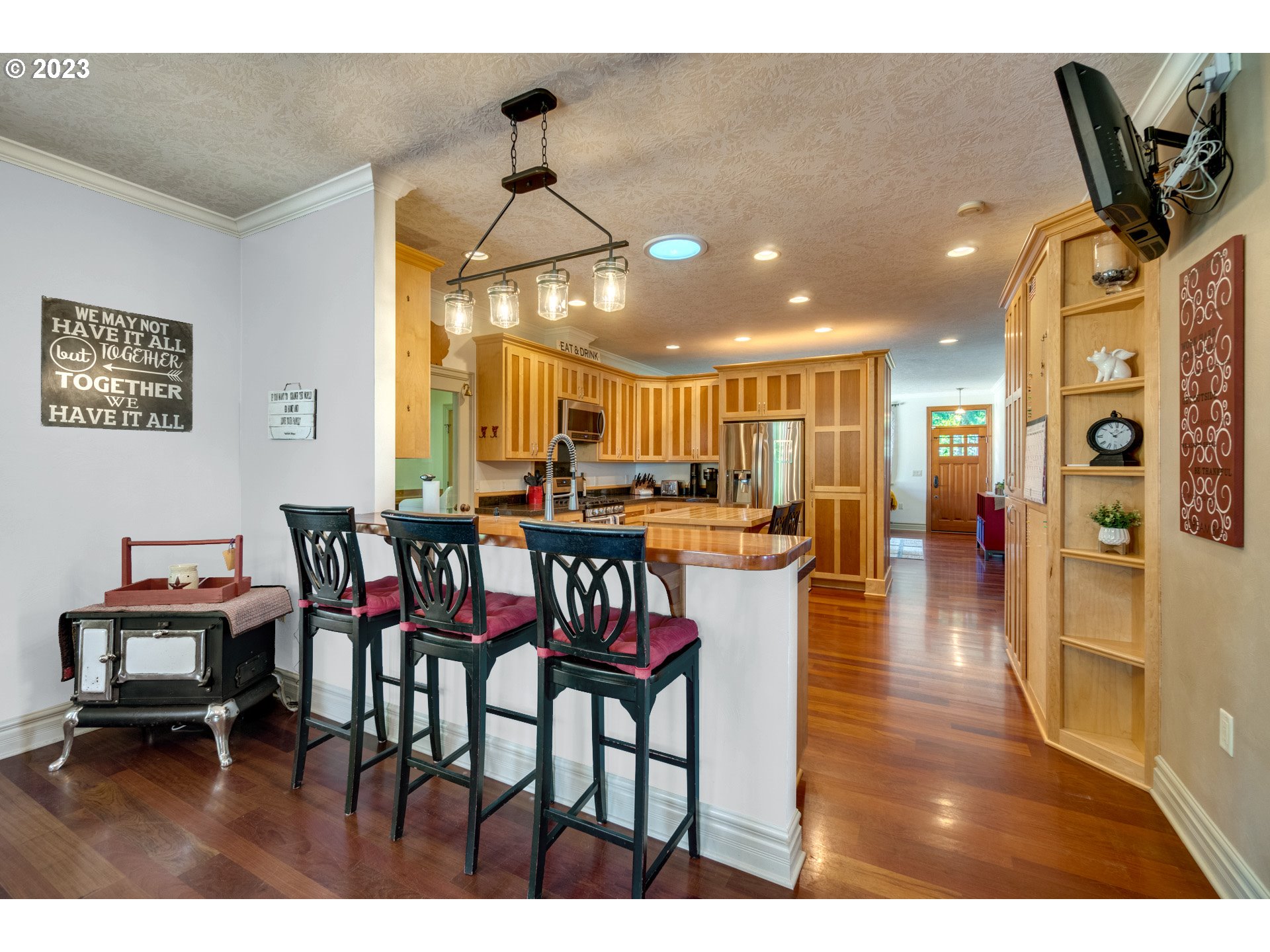 1675 South Boones Ferry Road Woodburn, OR 97071 - Photo 2 of 45 a view of a dining room with furniture and wooden floor