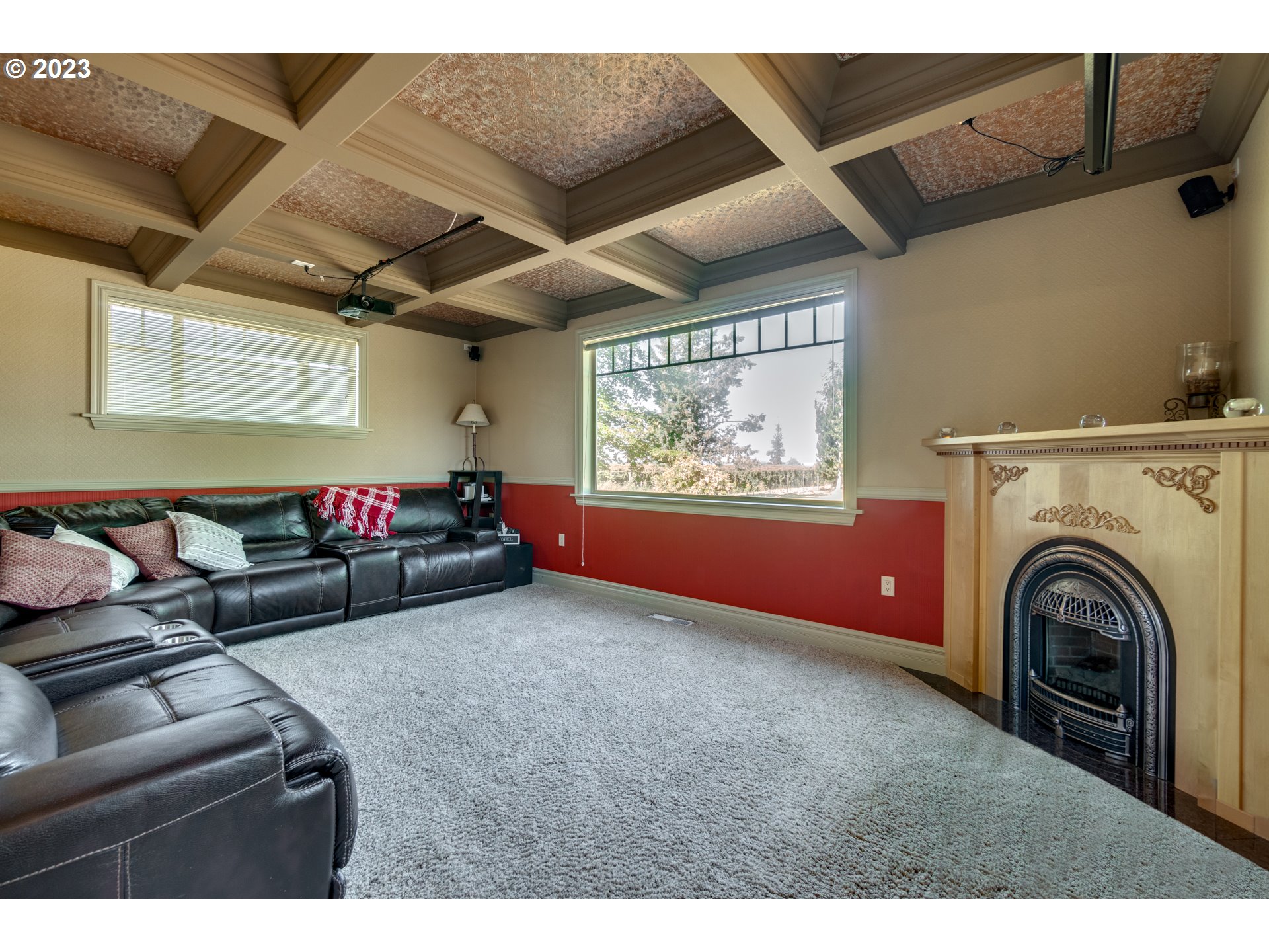1675 South Boones Ferry Road Woodburn, OR 97071 - Photo 27 of 45 a living room with furniture and a flat screen tv