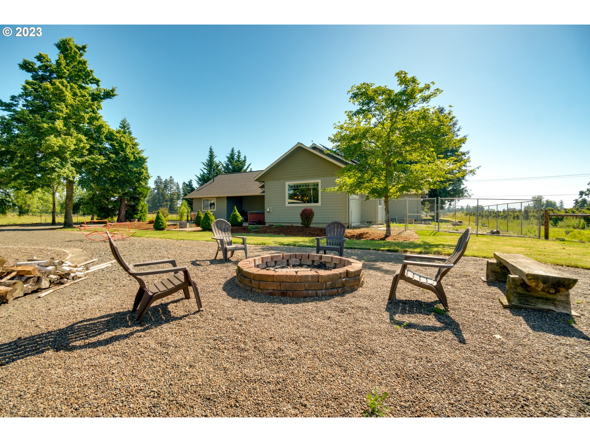 1675 South Boones Ferry Road Woodburn, OR 97071 - Photo 34 of 45 a view of a swimming pool and lounge chair