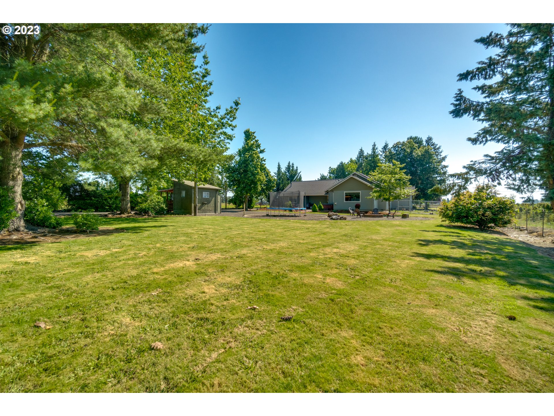 1675 South Boones Ferry Road Woodburn, OR 97071 - Photo 35 of 45 a view of a tree in a yard