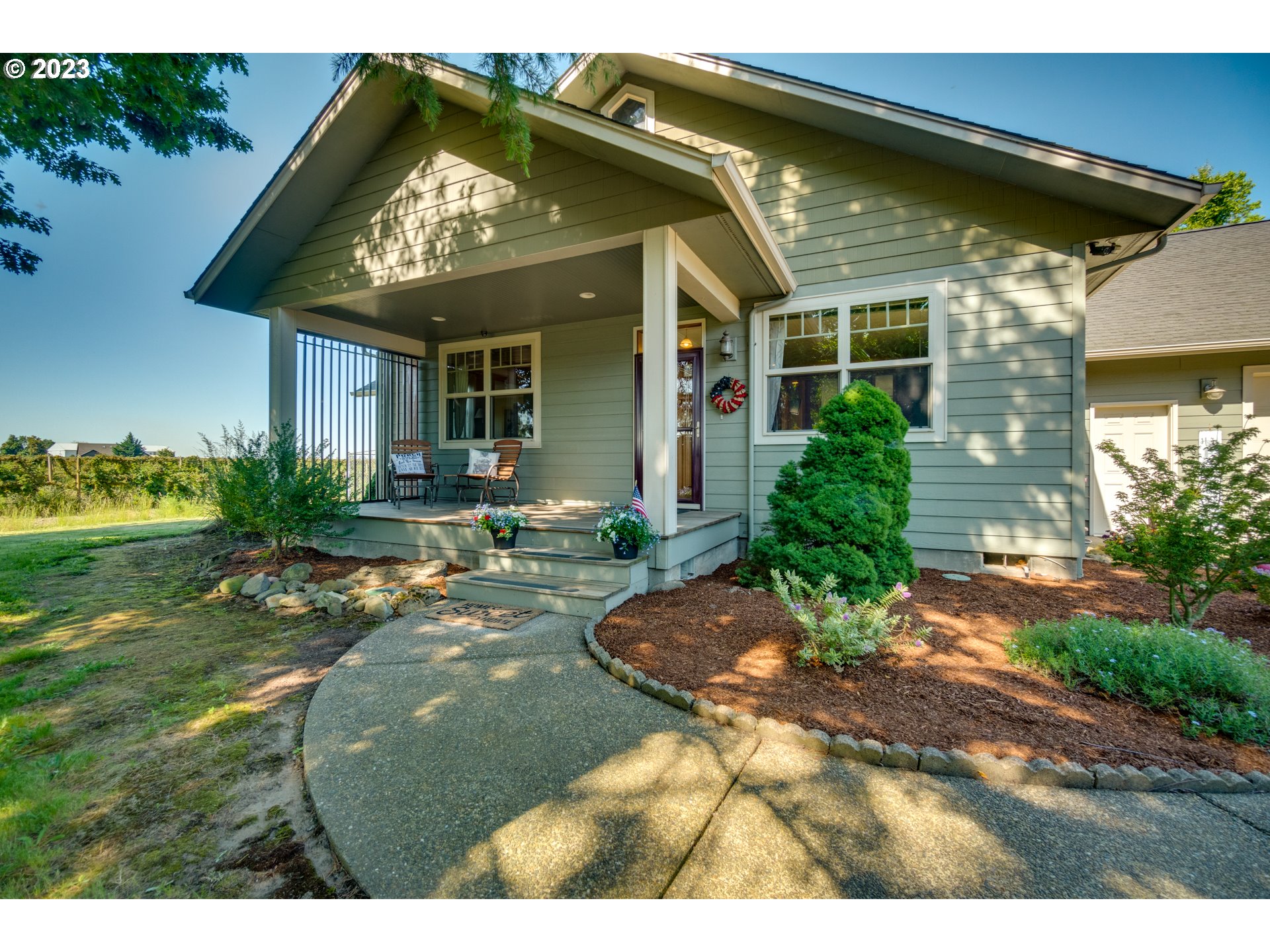 1675 South Boones Ferry Road Woodburn, OR 97071 - Photo 43 of 45 a view of a house with a porch