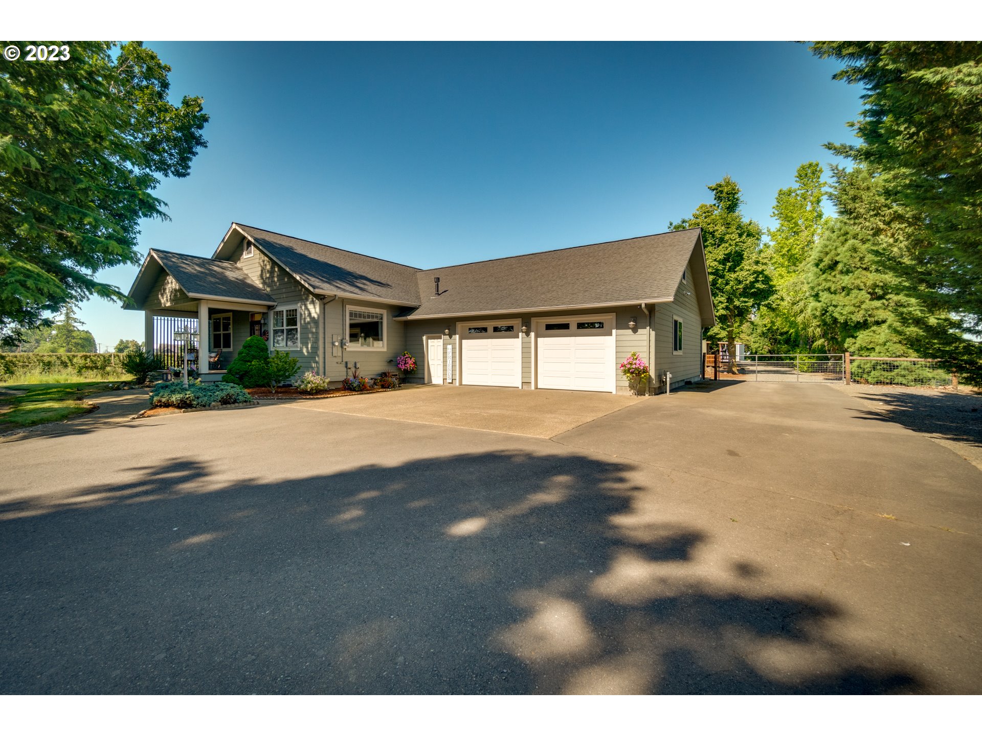 1675 South Boones Ferry Road Woodburn, OR 97071 - Photo 44 of 45 a front view of a house with a yard