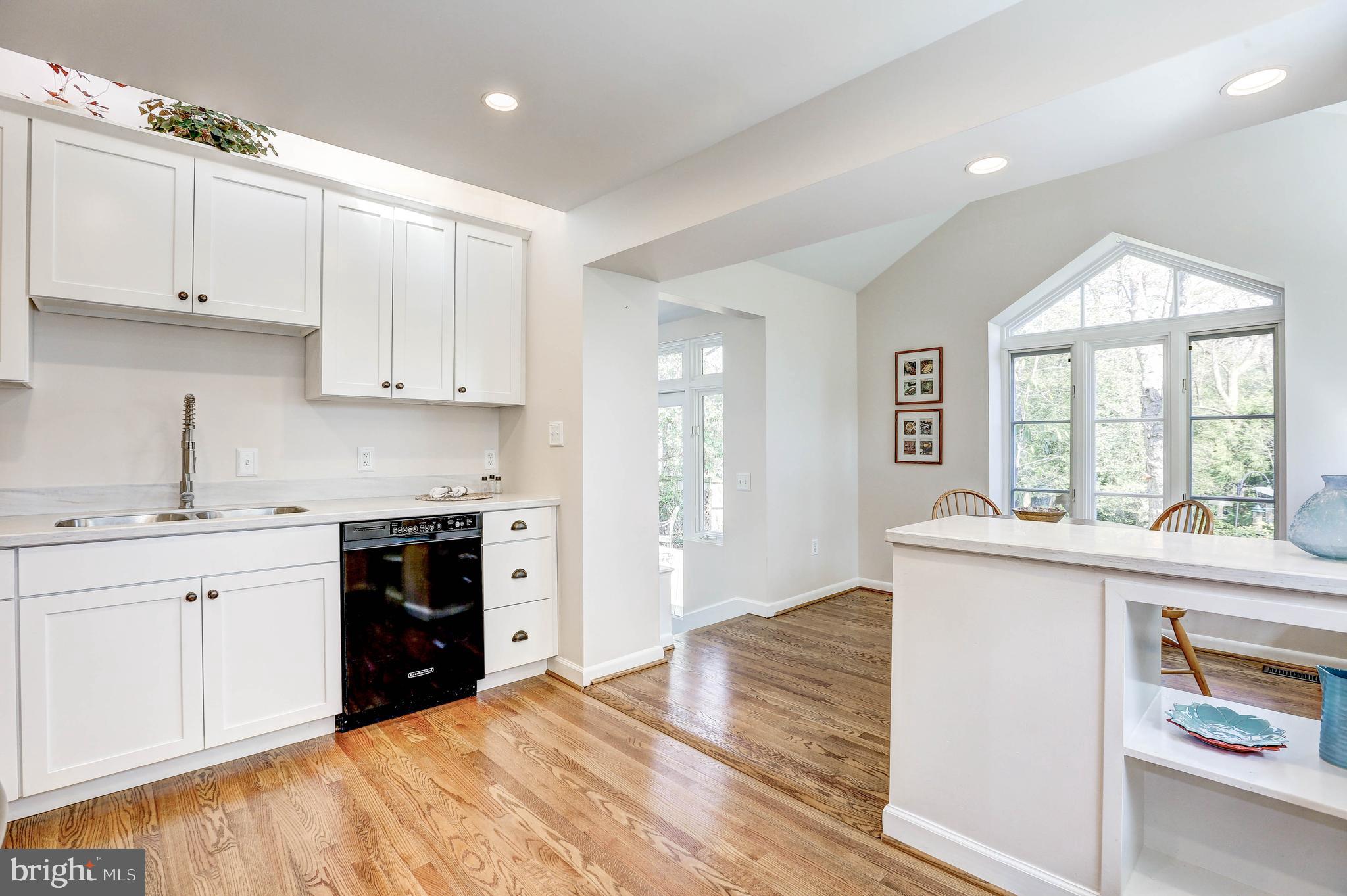 1015 Woodside Parkway Silver Spring, MD 20910 - Photo 25 of 60 Renovated kitchen flooded with natural light.