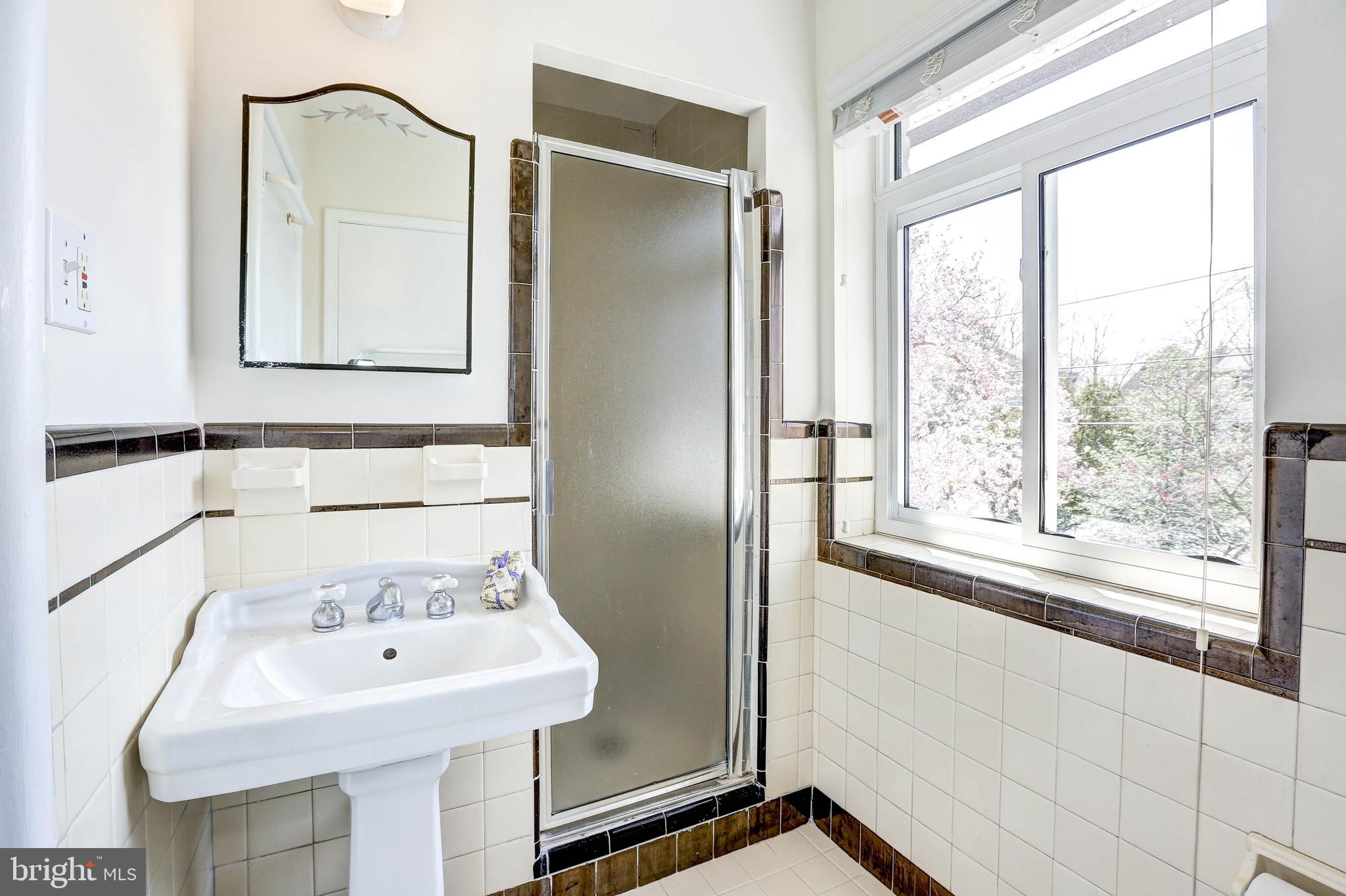1015 Woodside Parkway Silver Spring, MD 20910 - Photo 32 of 60 Master bathroom w/original tile work.