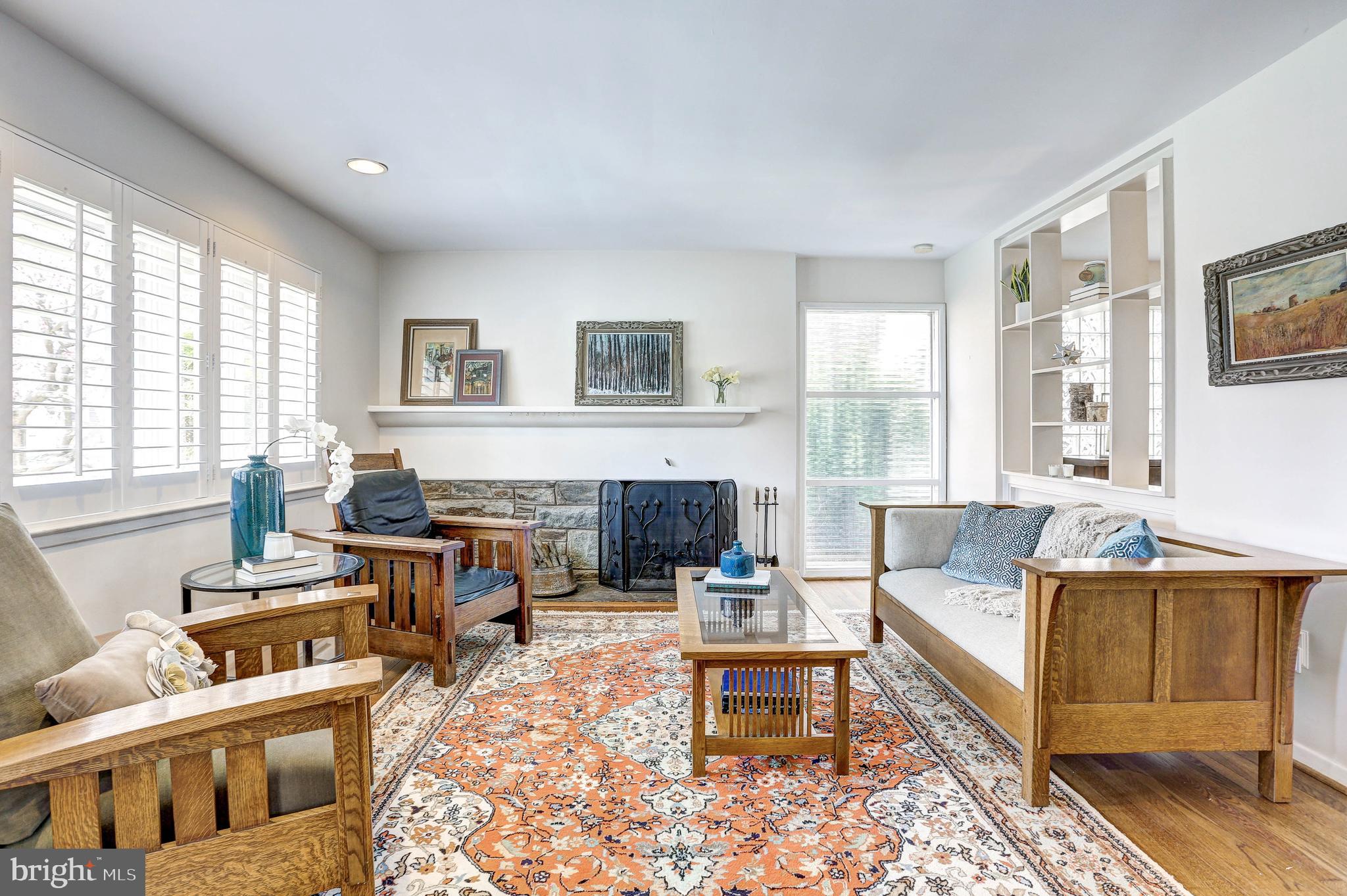 1015 Woodside Parkway Silver Spring, MD 20910 - Photo 9 of 60 Living room with wood burning fireplace.