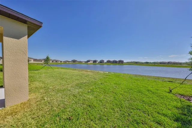 a view of swimming pool from a balcony