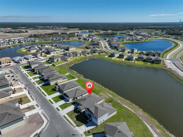 a view of a terrace with wooden floor and fence