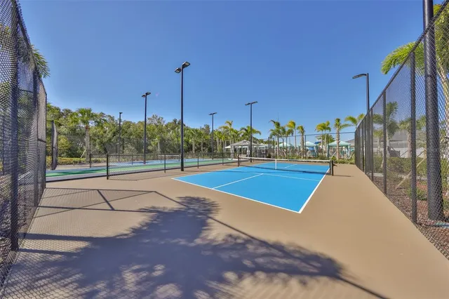a living room with couch and a large window
