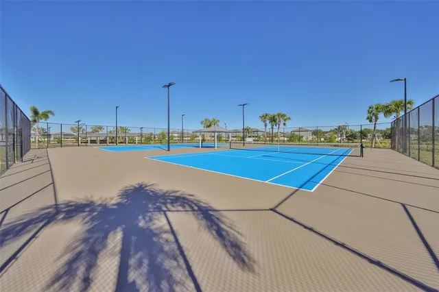 a view of a chairs and table in patio