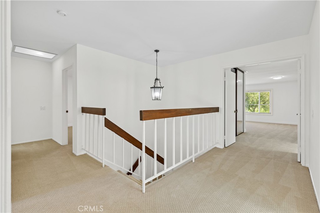 19 Alameda Irvine, CA 92620 - Photo 35 of 55 a view of a hallway with staircase