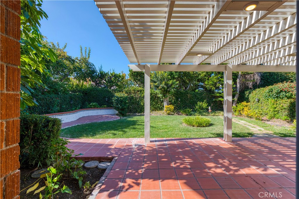 19 Alameda Irvine, CA 92620 - Photo 49 of 55 a view of a backyard with plants and a patio