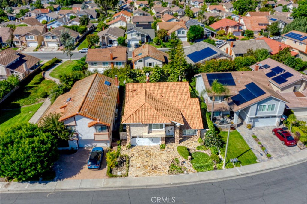 19 Alameda Irvine, CA 92620 - Photo 5 of 55 an aerial view of residential houses and street