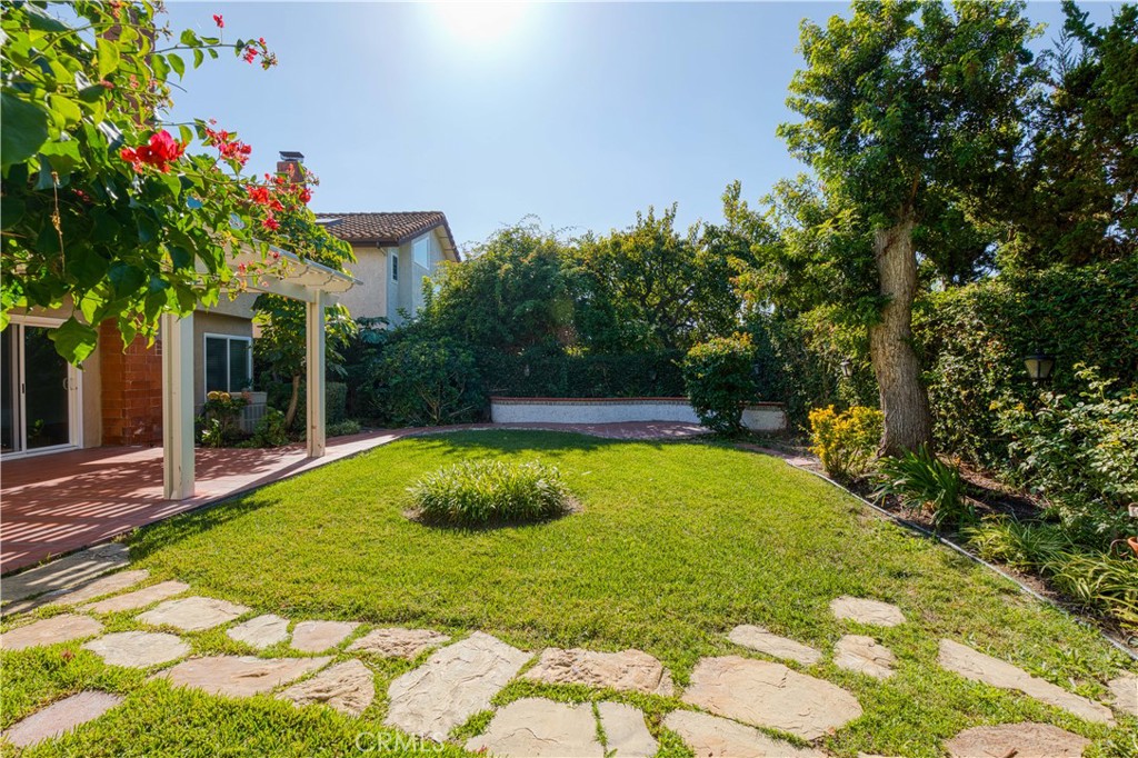 19 Alameda Irvine, CA 92620 - Photo 52 of 55 a backyard of a house with lots of green space