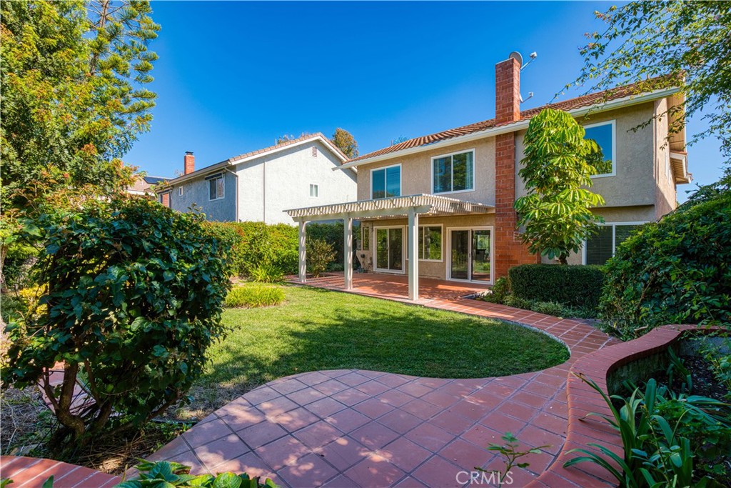 19 Alameda Irvine, CA 92620 - Photo 54 of 55 a view of a house with a yard