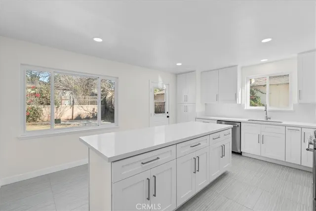 a view with cabinets and window