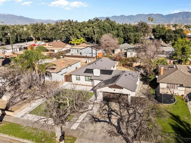 an aerial view of residential house with outdoor space