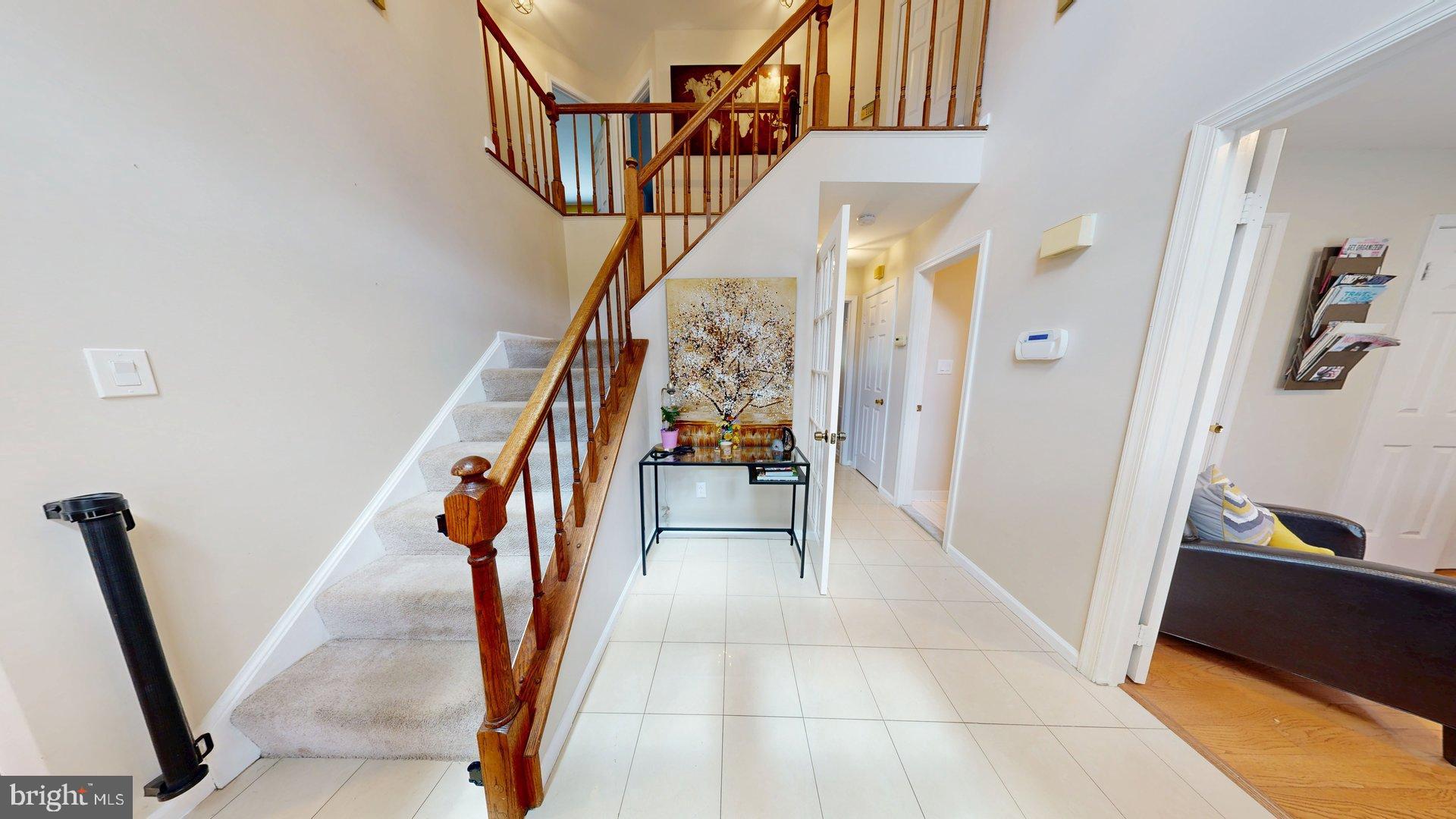 11901 Rustic Farm Court Germantown, MD 20874 - Photo 2 of 134 Inviting foyer with elegant staircase.