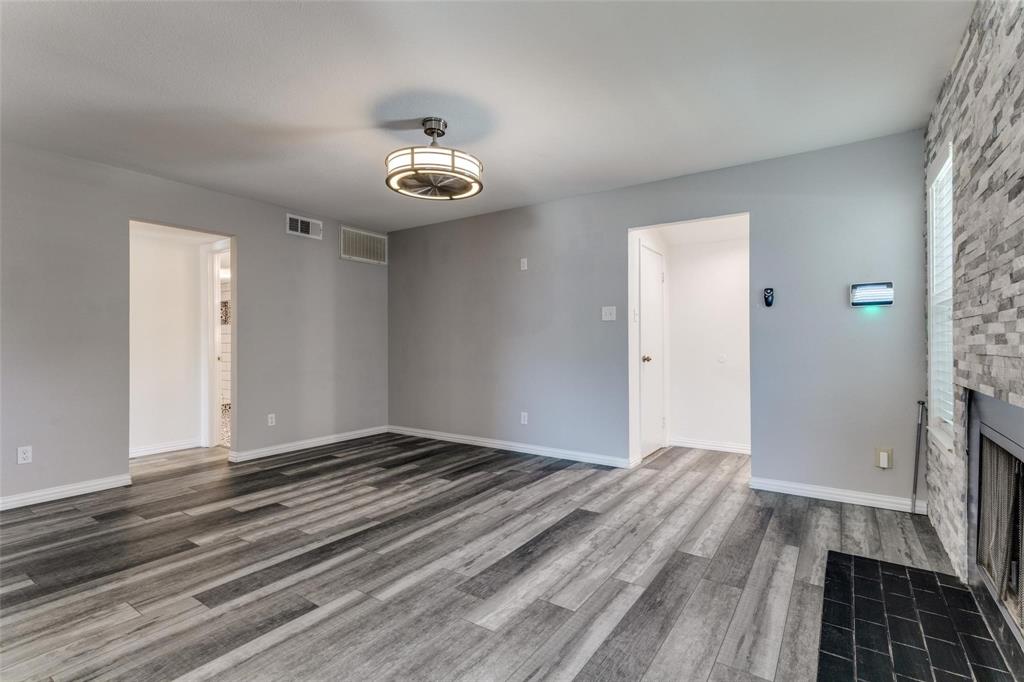 606 Ridgeline Drive Hurst, TX 76053 - Photo 7 of 29 a view of a room with wooden floor