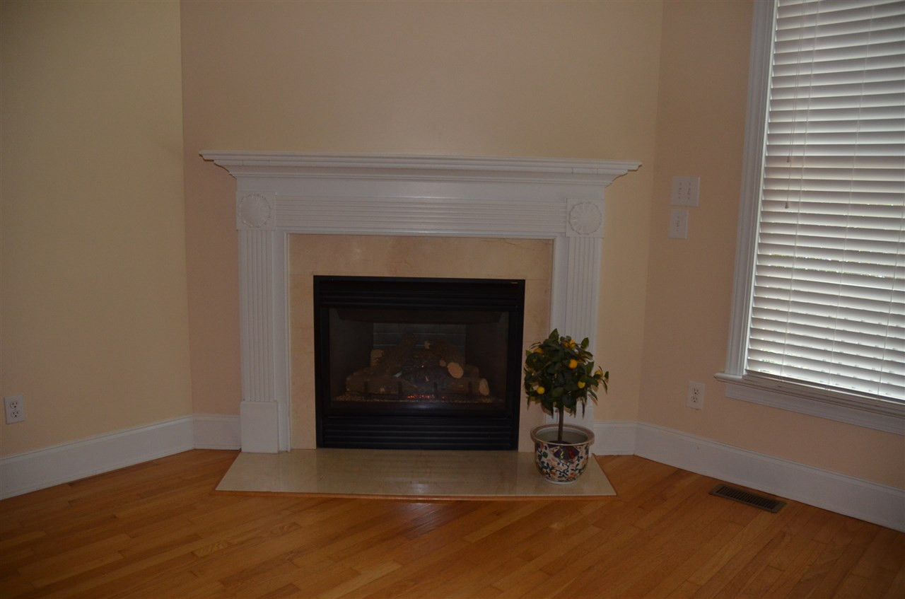 1843 Middlebrook Drive Raleigh, NC 27615 - Photo 10 of 13 See your friends gathered around this cozy, gas log fireplace when Fall comes! Den/Family/Great Room
