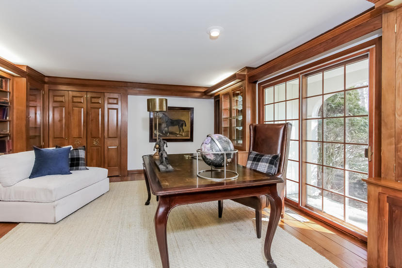 40 Allwood Road Darien, CT 06820 - Photo 12 of 50 a living room with furniture and a flat screen tv