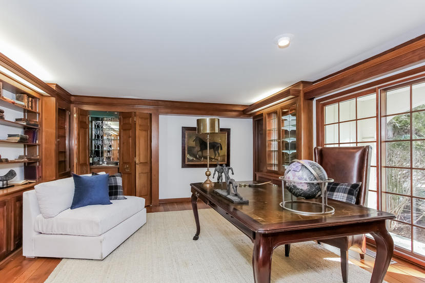 40 Allwood Road Darien, CT 06820 - Photo 14 of 50 a living room with furniture and a floor to ceiling window