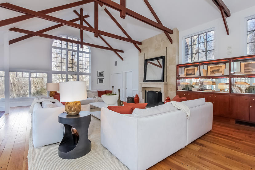 40 Allwood Road Darien, CT 06820 - Photo 22 of 50 a living room with fireplace furniture and a large window