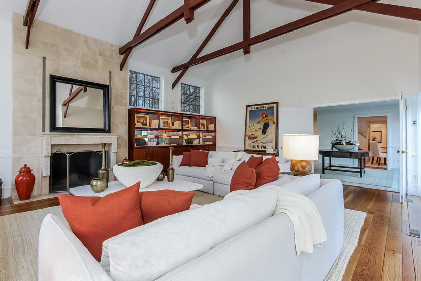 40 Allwood Road Darien, CT 06820 - Photo 24 of 50 a living room with furniture and a fireplace