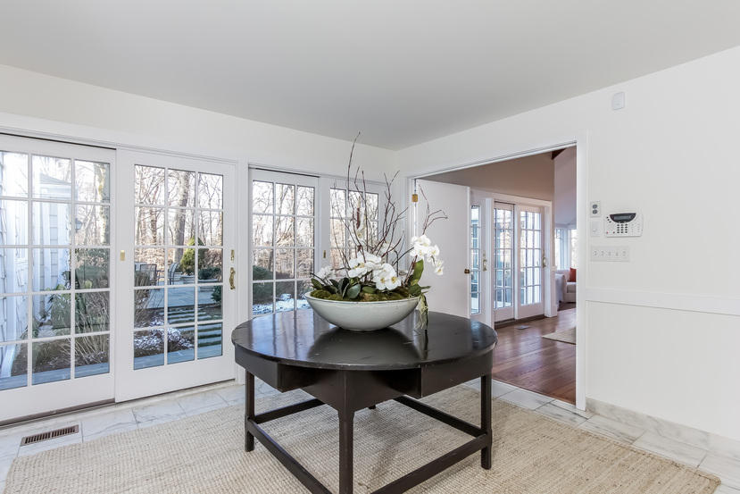 40 Allwood Road Darien, CT 06820 - Photo 26 of 50 a view of a dining room with furniture window and outside view