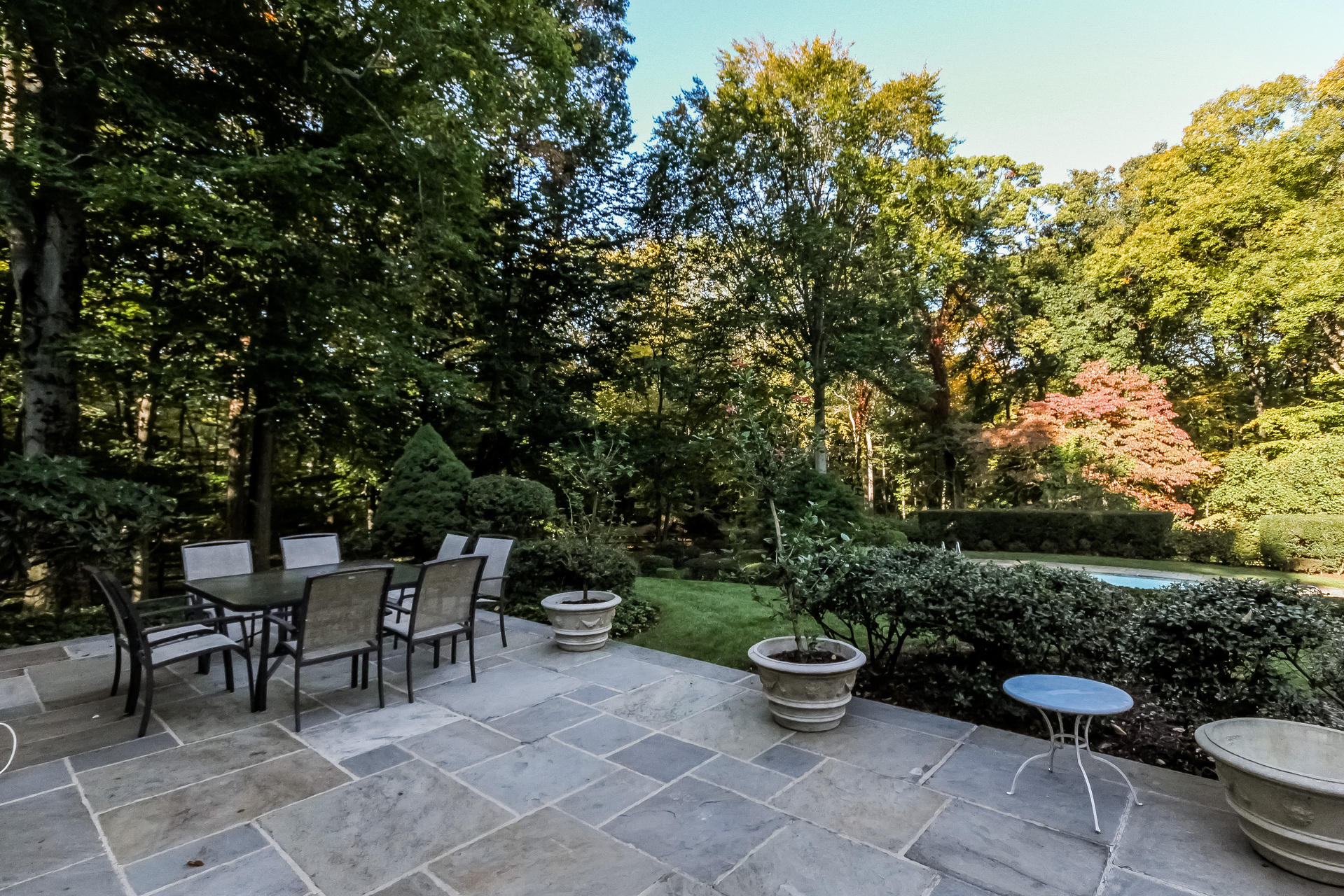 40 Allwood Road Darien, CT 06820 - Photo 28 of 50 a view of a patio with chairs and plants