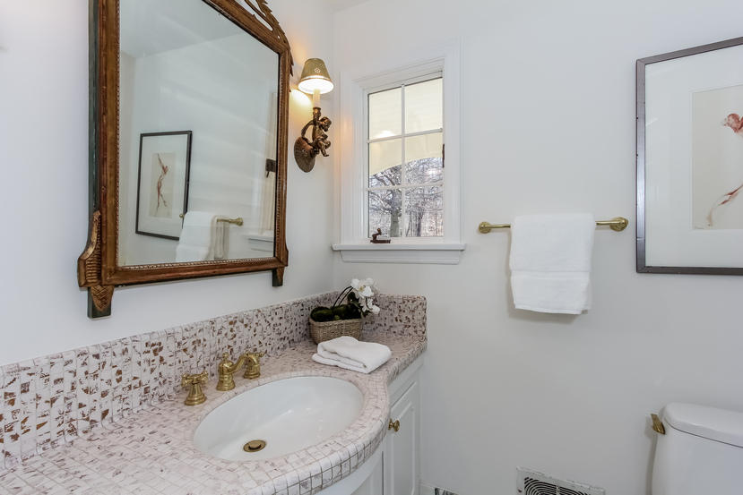 40 Allwood Road Darien, CT 06820 - Photo 30 of 50 a bathroom with a sink vanity and mirror
