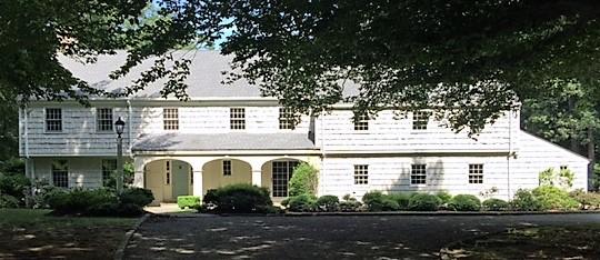 40 Allwood Road Darien, CT 06820 - Photo 3 of 50 a front view of a house with garden