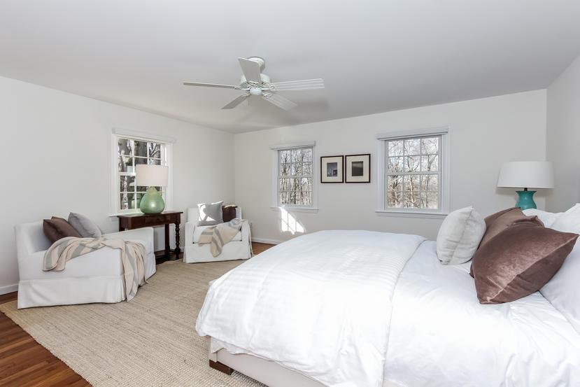 40 Allwood Road Darien, CT 06820 - Photo 33 of 50 a bedroom with a bed couch and window