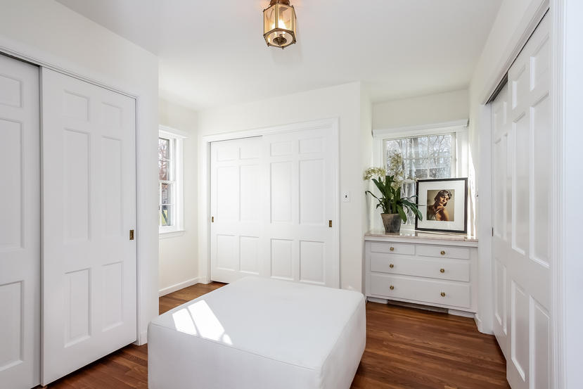 40 Allwood Road Darien, CT 06820 - Photo 35 of 50 a room that has a bed and a closet