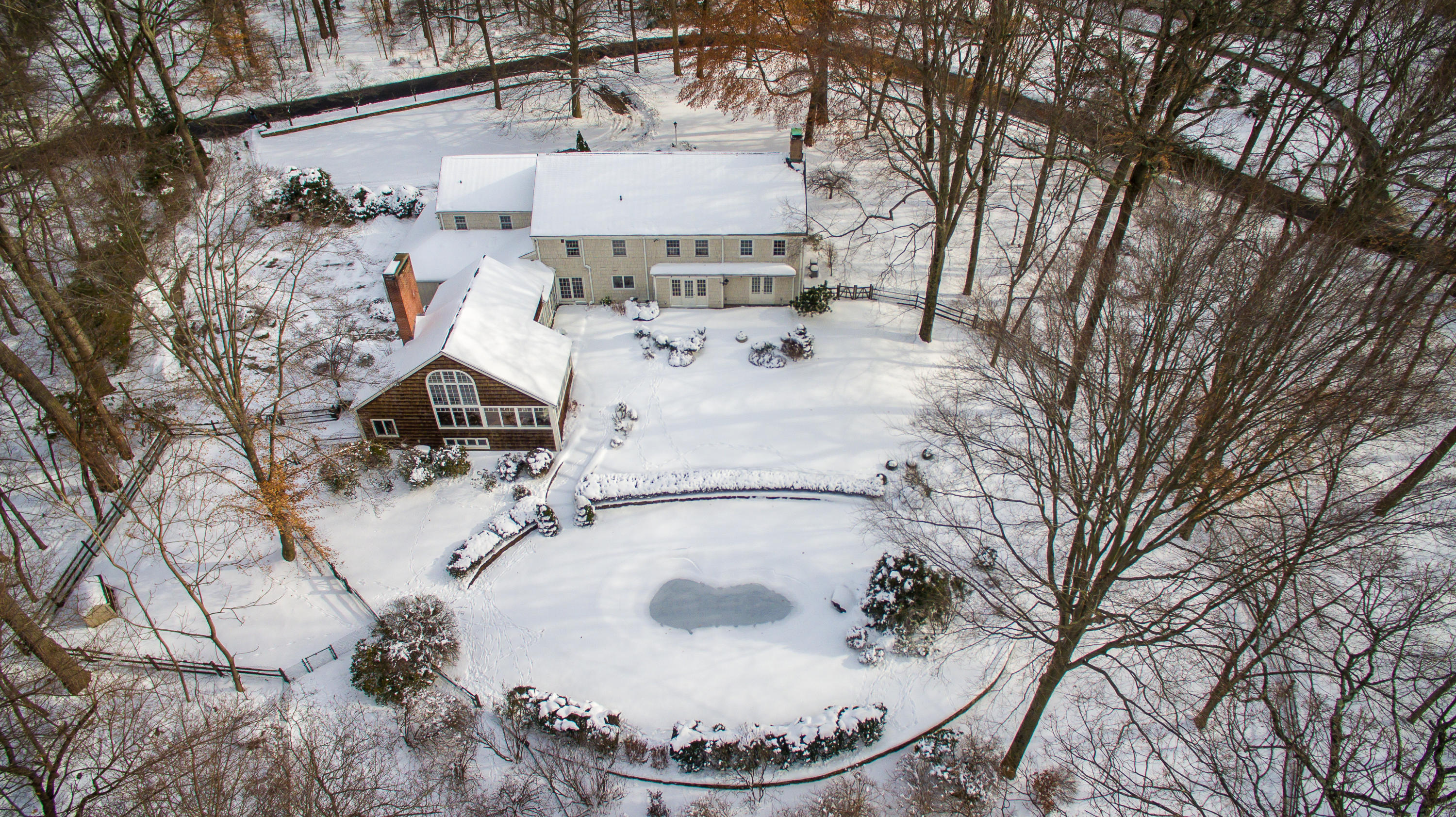 40 Allwood Road Darien, CT 06820 - Photo 47 of 50 a view of a house with large trees