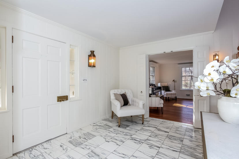 40 Allwood Road Darien, CT 06820 - Photo 6 of 50 a living room with furniture and a table