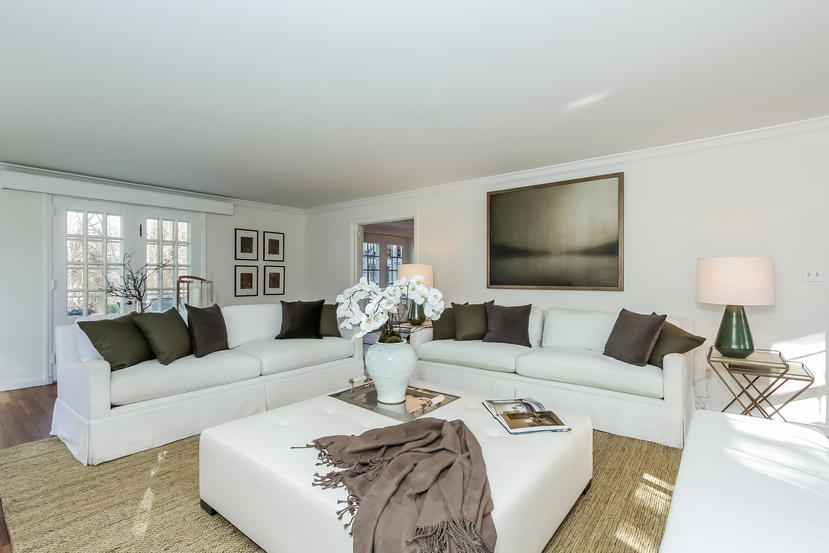40 Allwood Road Darien, CT 06820 - Photo 10 of 50 a living room with furniture and a flat screen tv