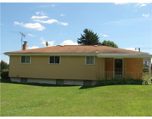 391 Moorehead Road Cabot, PA 16023 - Photo 3 of 8 Exterior Back. Covered back porch