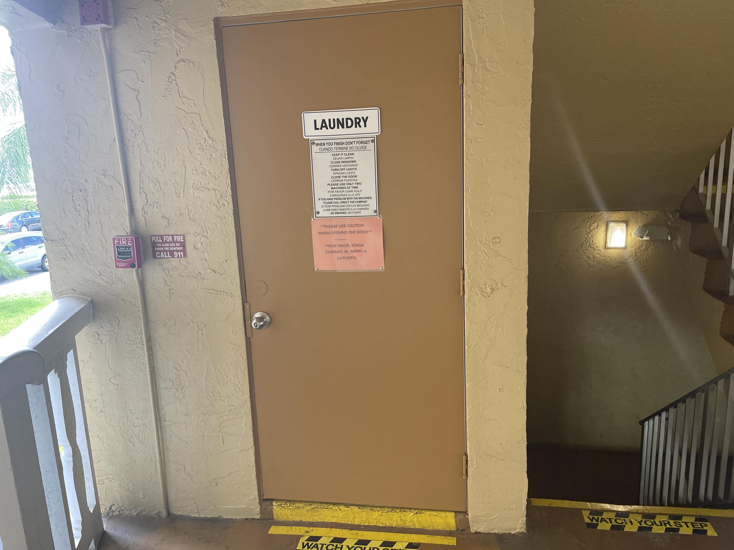 500 Village Green Circle West, Unit 212 Palm Springs, FL 33461 - Photo 20 of 23 a view of front door