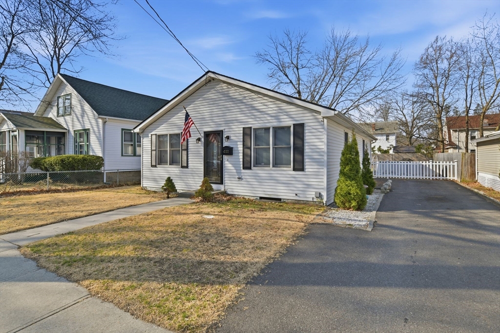 a front view of house with garage