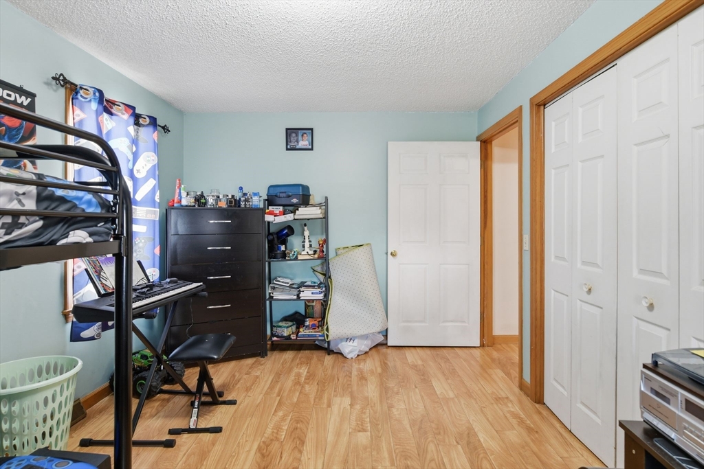 222 Edendale Street Springfield, MA 01104 - Photo 25 of 36 a view of a room with gym equipment