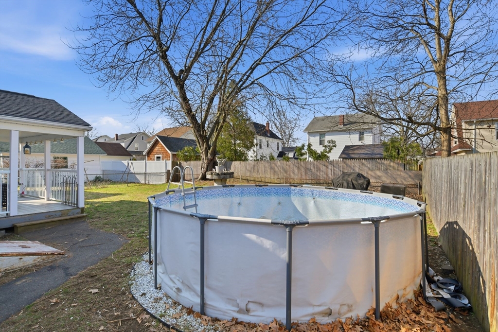 222 Edendale Street Springfield, MA 01104 - Photo 32 of 36 a view of a house with a yard