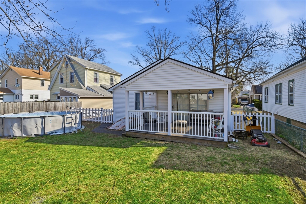 222 Edendale Street Springfield, MA 01104 - Photo 35 of 36 a view of a house with a yard and deck