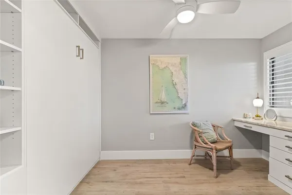 a bathroom with a toilet a sink and a mirror