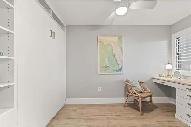 a bathroom with a toilet a sink and a mirror