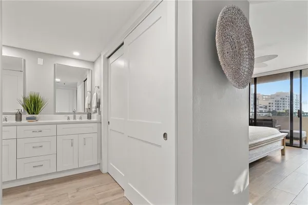 a view of a hallway with washer and dryer