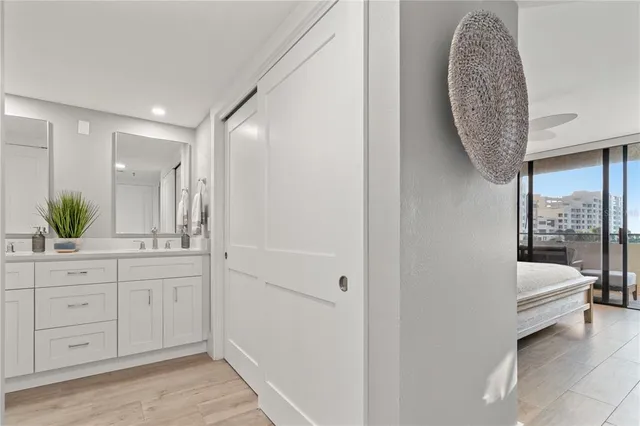 a view of a hallway with washer and dryer