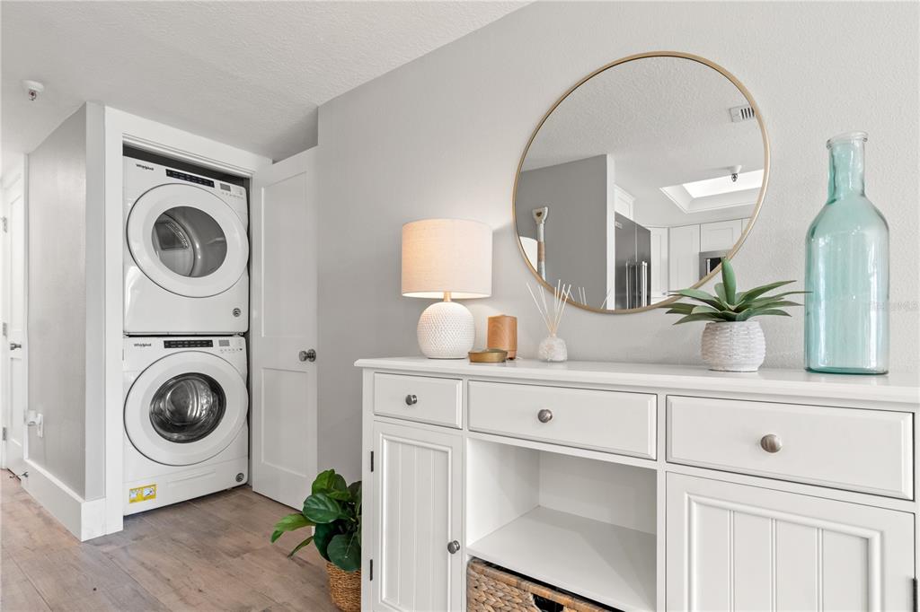 6035 Sea Ranch Drive, Unit 203 Hudson, FL 34667 - Photo 24 of 55 a view of a hallway with washer and dryer
