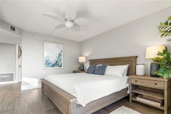a bathroom with a shower sink and vanity